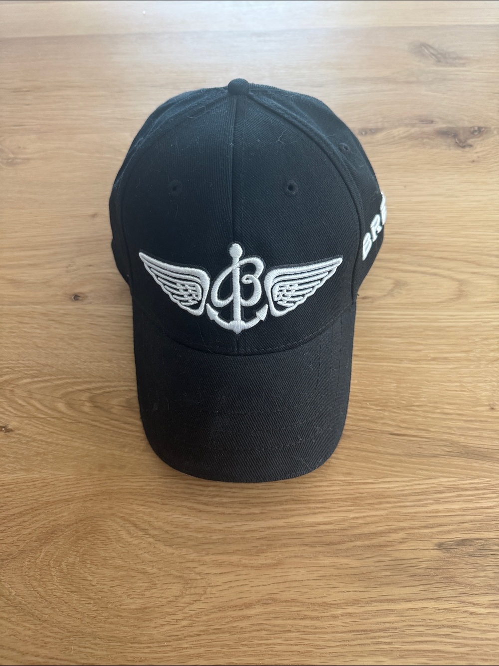 Breitling Black Baseball Cap with White Winged Anchor Emblem